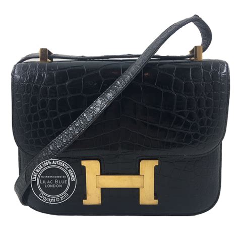 croc constance|Hermes Constance 23cm Black Shiny Croc GHW。